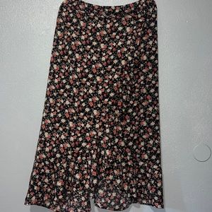SHEIN 4XL (equals 3XL) cross over black skirt with red & tan flowers. Cute!